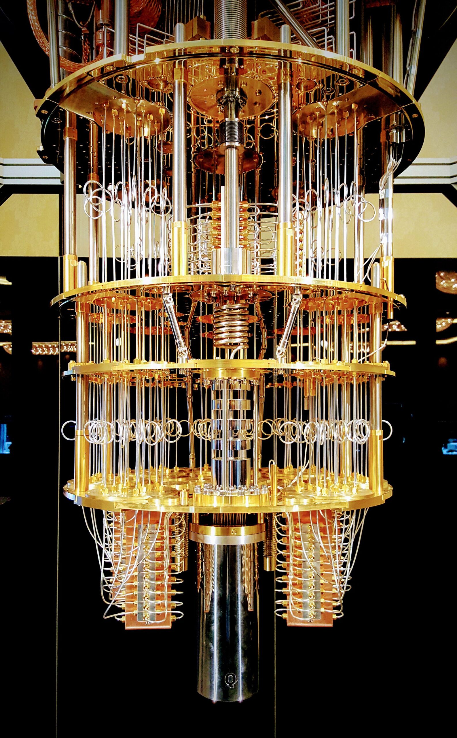 IBM Q quantum computer on display, showing the gold layered cryostat assembly